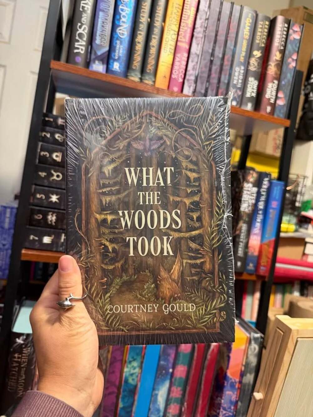 Owlcrate Edition What the Woods Took by Courtney Gould book